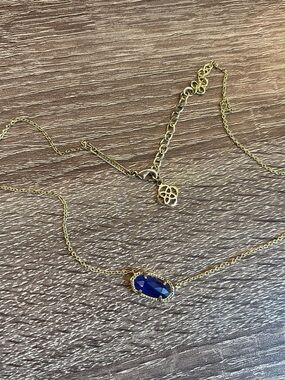 Blue stone Kendra Scott gold necklace